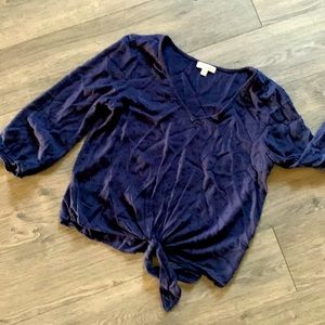 This Stitchfix textured blouse has a front tie around the waist